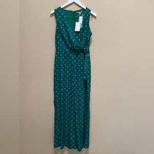 Green polka dot jumpsuit.  NWT. Size small.